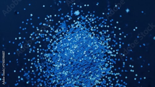 Wallpaper Mural Abstract blue confetti, square shaped particles falling against dark background Torontodigital.ca