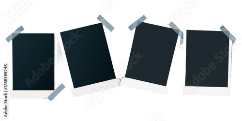 Four blank vintage instant photo frames taped to a black background with a retro feel