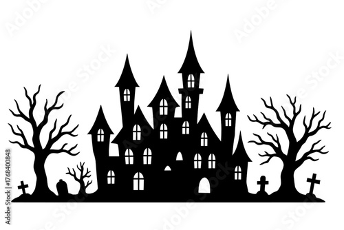 Halloween town, where haunted houses and spooky trees form a silhouette