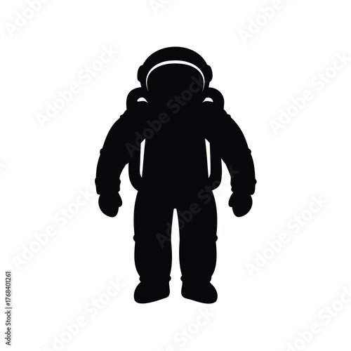 Silhouette image of an astronaut standing in a spacesuit ready for space mission