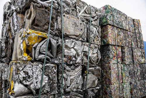 Wallpaper Mural Industrial piles of compressed scrap metal and colorful aluminum cans bundled in blocks, ready for recycling and reuse Torontodigital.ca