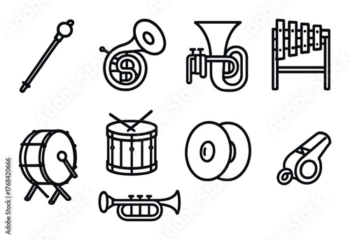 Collection of music instruments on dark background with drum, horn, trumpet, and cymbals