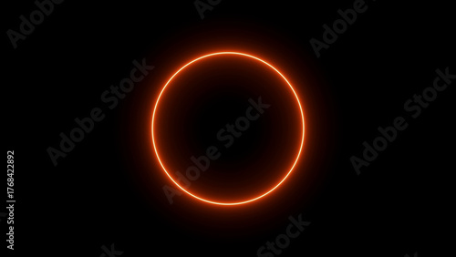 Glowing orange neon circle on a black background Keywords: orange, neon, circle, ring, glowing, light, luminous, electric, energy, abstract, futuristic, modern, dark, black, background, shape