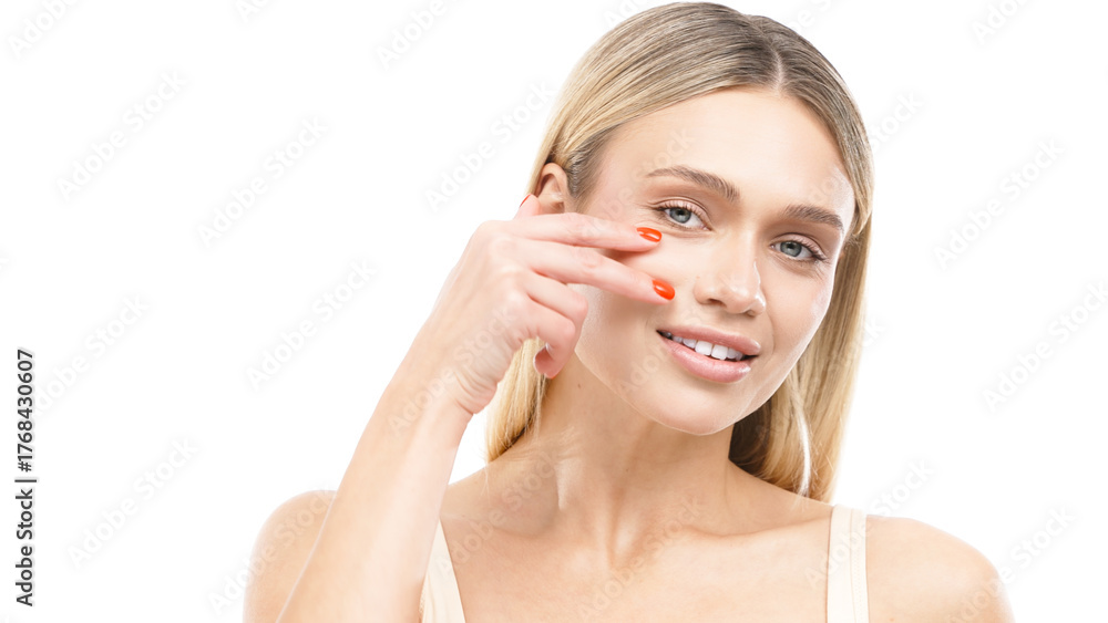 Fototapeta premium Beautiful young woman with clean fresh skin gently touching her face, showcasing a natural glow and healthy complexion, embodying beauty and self-care concept