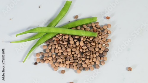 cluster beans or gawar phali(guar) and seed on the white background,cyamopsis tetragonoloba