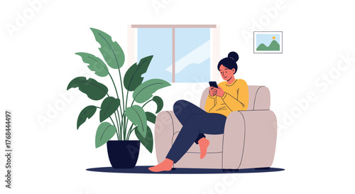 Woman relaxing at home on a cozy armchair, using a smartphone, surrounded by a houseplant and decor.