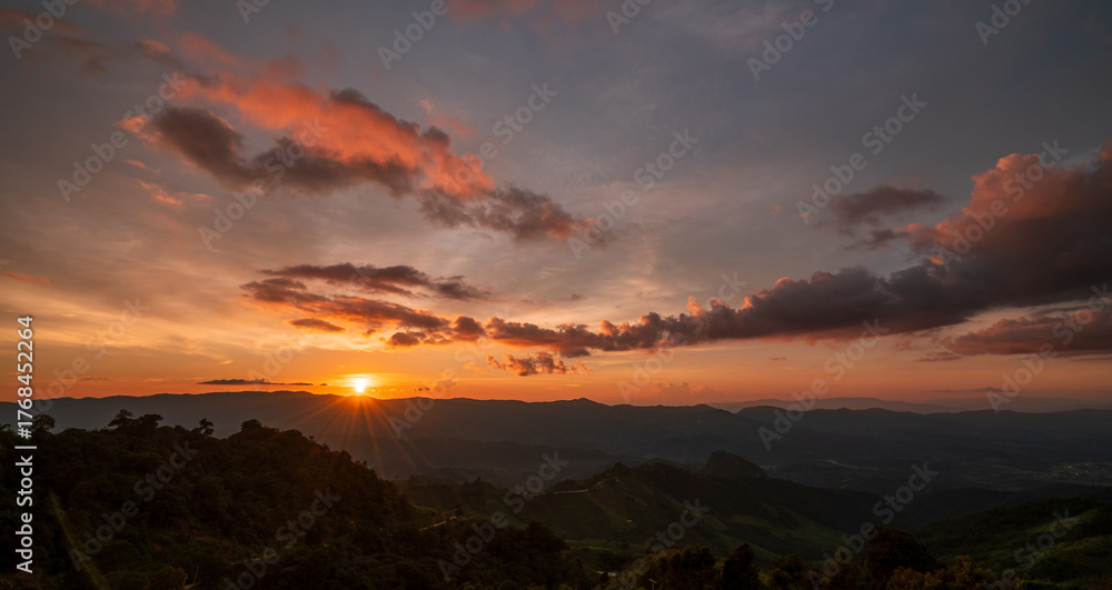 Fototapeta premium silhouettes mountains with orange sky in sunset time