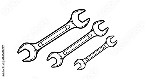 Four different-sized open-end wrenches arranged on a white background.