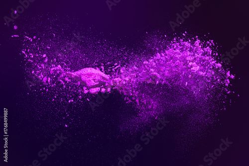 Dynamic Explosion of Vibrant Purple Powder Particles Scattering Against a Dark Background © Svetlana Radayeva