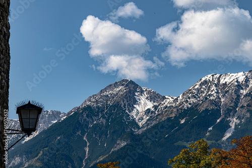 Snow-Capped Alpine Mountains with Blue Sky and Lantern – Scenic Mountain Landscape, Travel and Nature Photography