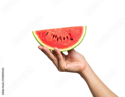 Hand Holding Slice of Watermelon with Seeds on Black fruit