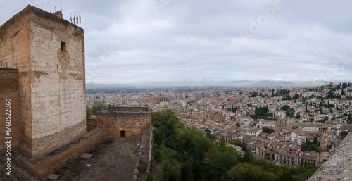 Granada, Spain - 21 Oct 2025: View of Granada cityscape from the Alcazaba, fortress towers and outer walls of Alhambra