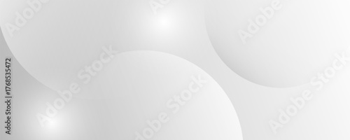 A minimalist abstract background featuring overlapping curves and circular shapes in various shades of gray, creating a smooth gradient and subtle depth