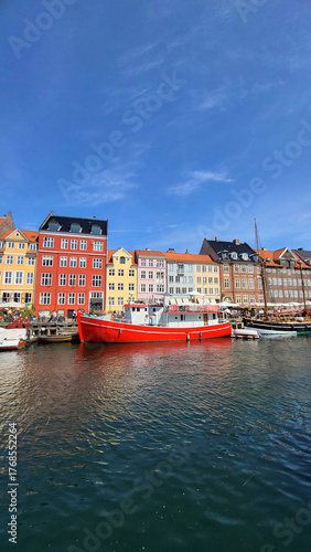Photography 07 August, 2024, Copenhagen city center, Denmark Summer day scenic canal with bo