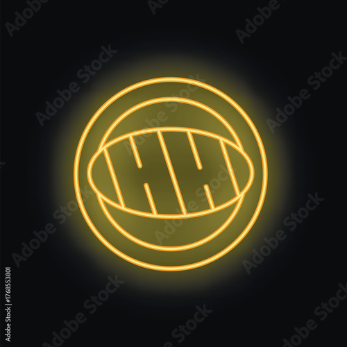 Neon sign in the shape of a grilled steak on a plate is glowing brightly against a black background