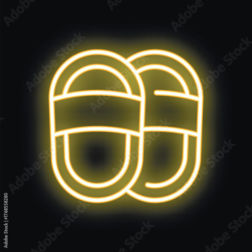 Yellow glowing neon sign representing a pair of slippers on a black background