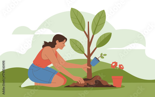 Woman planting a tree outdoors creating a greener environment for future generations and nature conservation