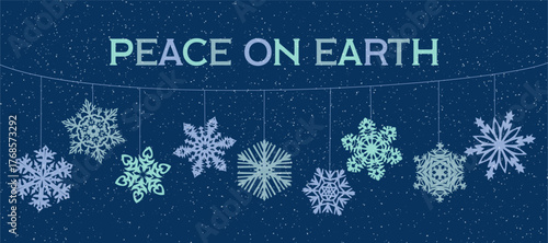Snowflakes and winter message of peace on earth