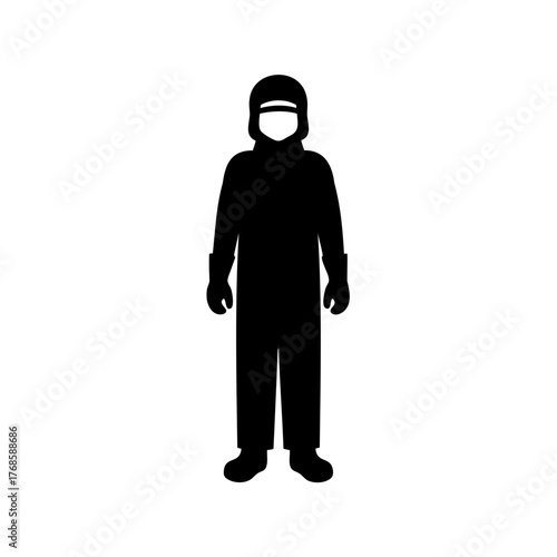 Silhouette of person wearing a hazmat suit and a protective helmet and gloves