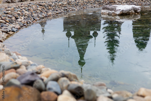 An Orthodox church reflected in the lake. A provincial church in Russia. 