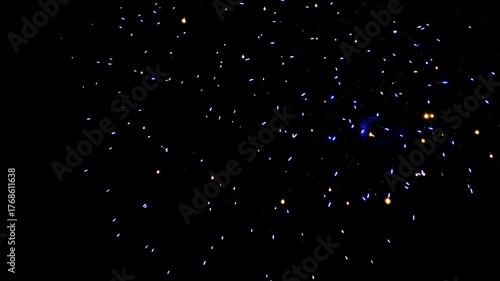 Bright colorful festive glowing fireworks on night sky.  New Year, Christmas, festival, party and holiday celebration concept