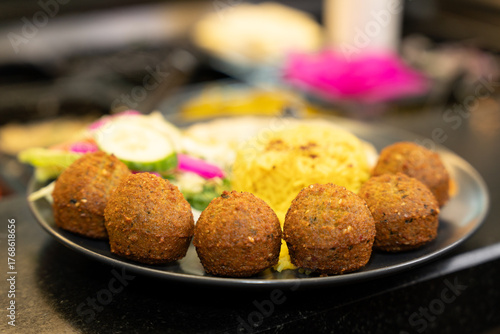 Falafel Balls with Rice and Salad – Middle Eastern Dish