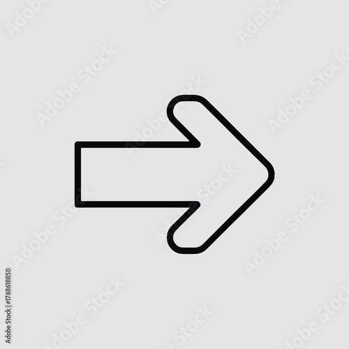 A simple black outline of a right arrow pointing towards the right on a light gray background plain