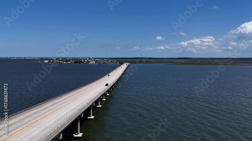 Wallpaper Mural Aerial View Of Washington Baum Bridge Over Calm Water of Roanoke Sound Connecting Roanoke Island to Nags Head on the Outer Banks. Bright blue sky, tranquil water, urban-seaside scene. Torontodigital.ca