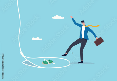 Money trap to trick greed people, danger fraud or threat to attack victim, financial or investment problem concept, greed businessman try to step into tricky rope trap to get money banknotes bundle.