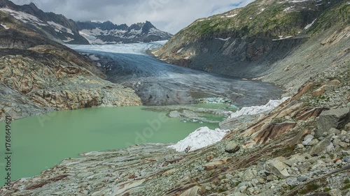 Time lapse, view of melting glacier in the Swiss Alps. Rhone Glacier, the source of the river Rhone. Furka Pass, Canton Valais, Switzerland