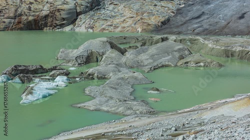 Time lapse, ice in a glacier lake. Melting glacier in the Swiss Alps. Rhone Glacier, the source of the river Rhone. Furka Pass, Canton Valais, Switzerland