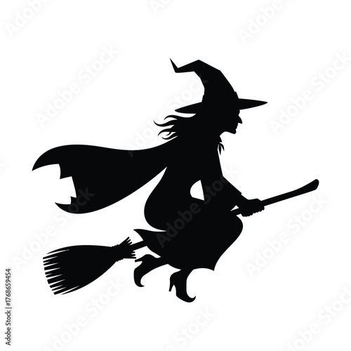 Silhouette of a witch flying on a broomstick with cape flowing in the wind for halloween silhouette