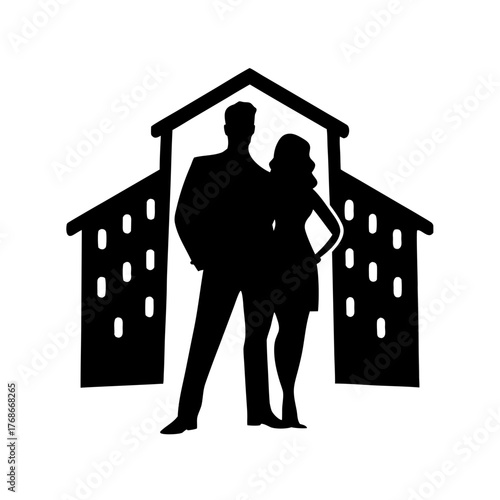 Silhouette of a couple standing in front of a building with multiple windows and a peaked roof design