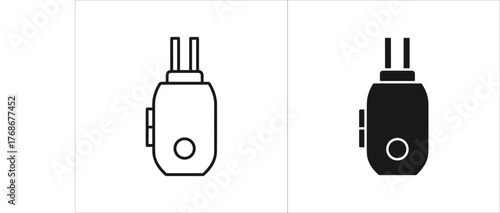 Outline and filled icon of a small electronic device with a button and two prongs