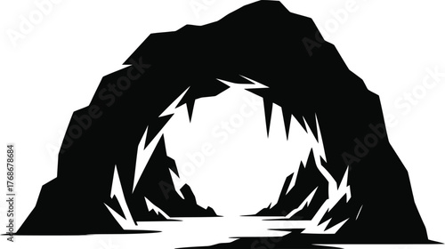 Dark silhouette of a natural cave entrance