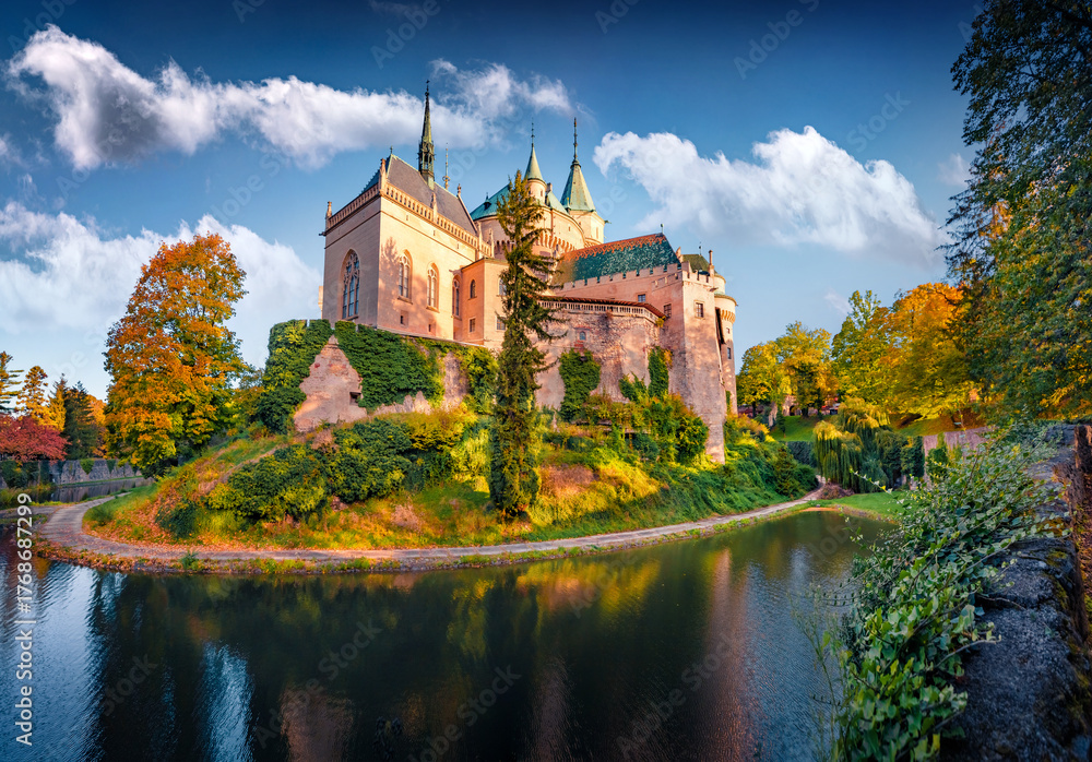 Naklejka premium Gorgeous autumn view of Castle of Spirits (Bojnice Castle). Spectacular morning cityscape of Bojnice, historical town in east Slovakia located on the Nitra river. Traveling concept background.