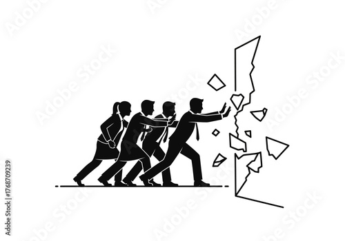 Team of business people working together to break through a wall symbolizing overcoming obstacles and achieving goals