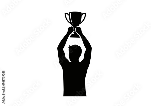 Silhouette of a triumphant athlete raising a golden trophy high above their head in celebration of victory