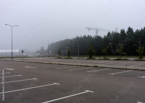 Empty parking lot in fog