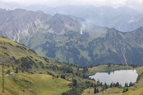 Stunning lake view at Nebelhorn mountain and surrounding landscapes in the German Alps