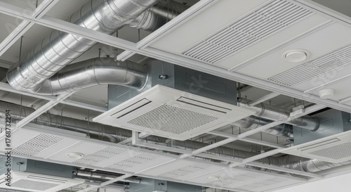 Modern commercial ceiling with air conditioning and ventilation provides a cool and comfortable environment