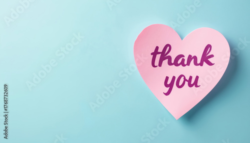 Wallpaper Mural Pink heart shaped sticky note with thank you message in script font on a pastel blue background. Blank space for text. Expressing gratitude. Torontodigital.ca