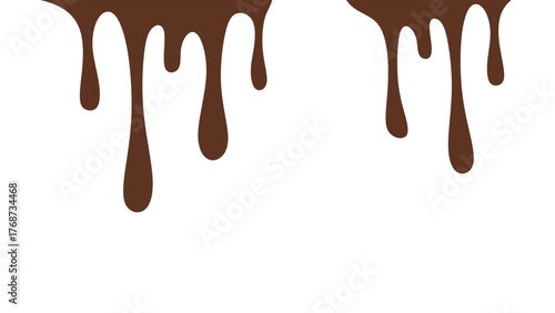 Melted chocolate or syrup drips isolated on a white background. Flowing liquid chocolate border element. A sweet brown syrup or sauce that melts and drips.