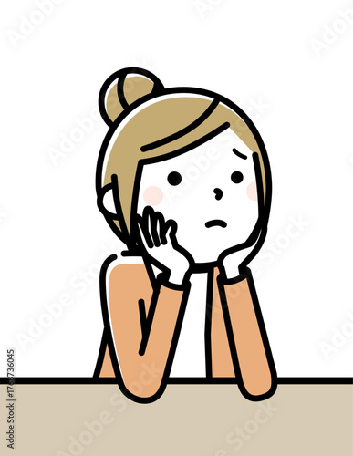 ひじをついて考え事をする若い女性