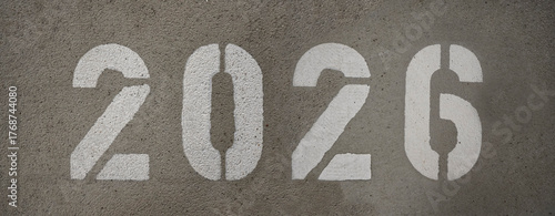 2026 number written on the concrete floor.          