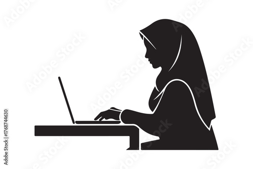 Silhouette of a woman in a hijab working on a laptop