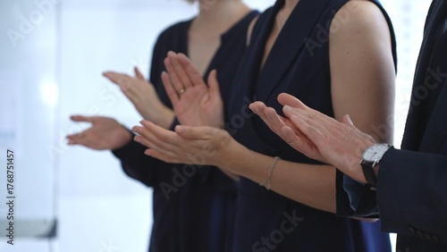 Obraz na płótnie Business people applauding, showing appreciation and celebrating success during