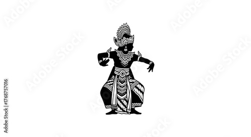 Silhouette of traditional Indonesian dancer in detailed costume against white backdrop showcasing