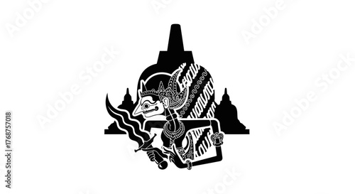 Shadow puppet performance art with a traditional kris and Borobudur temple view