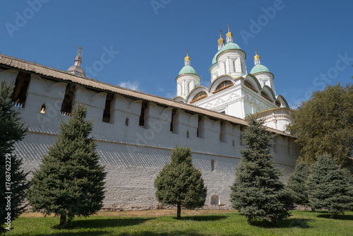 Astrakhan, Russia. View of the wall of the Astrakhan Kremlin and the domes of the Assumption Cathedral.